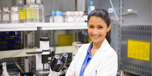 Smiling Healthcare Nurse In Lab